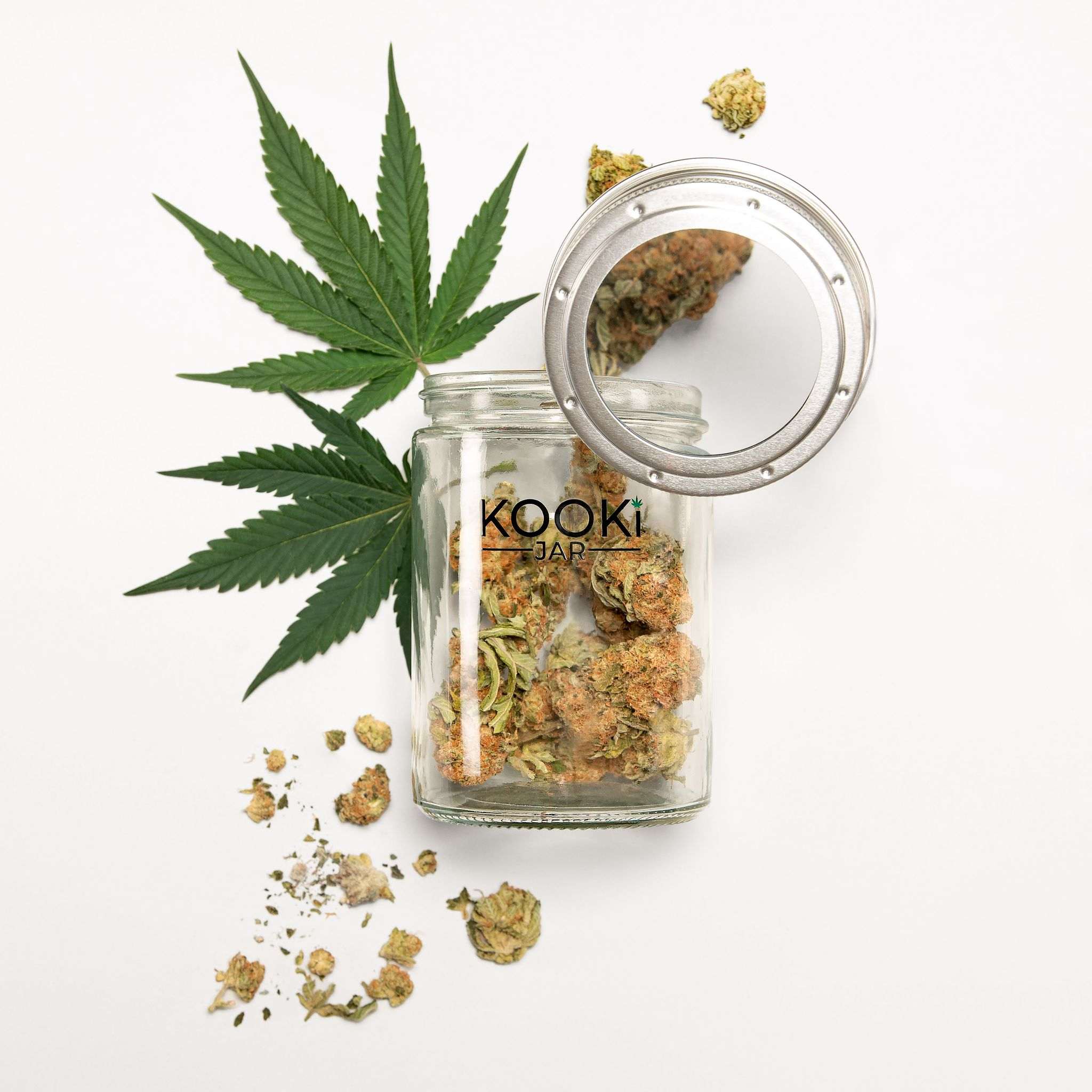 Large clear glass jar with 5x magnifying lid for weed storage